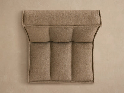 Back view of Porto armless chair in dark beige fabric with channel stitching