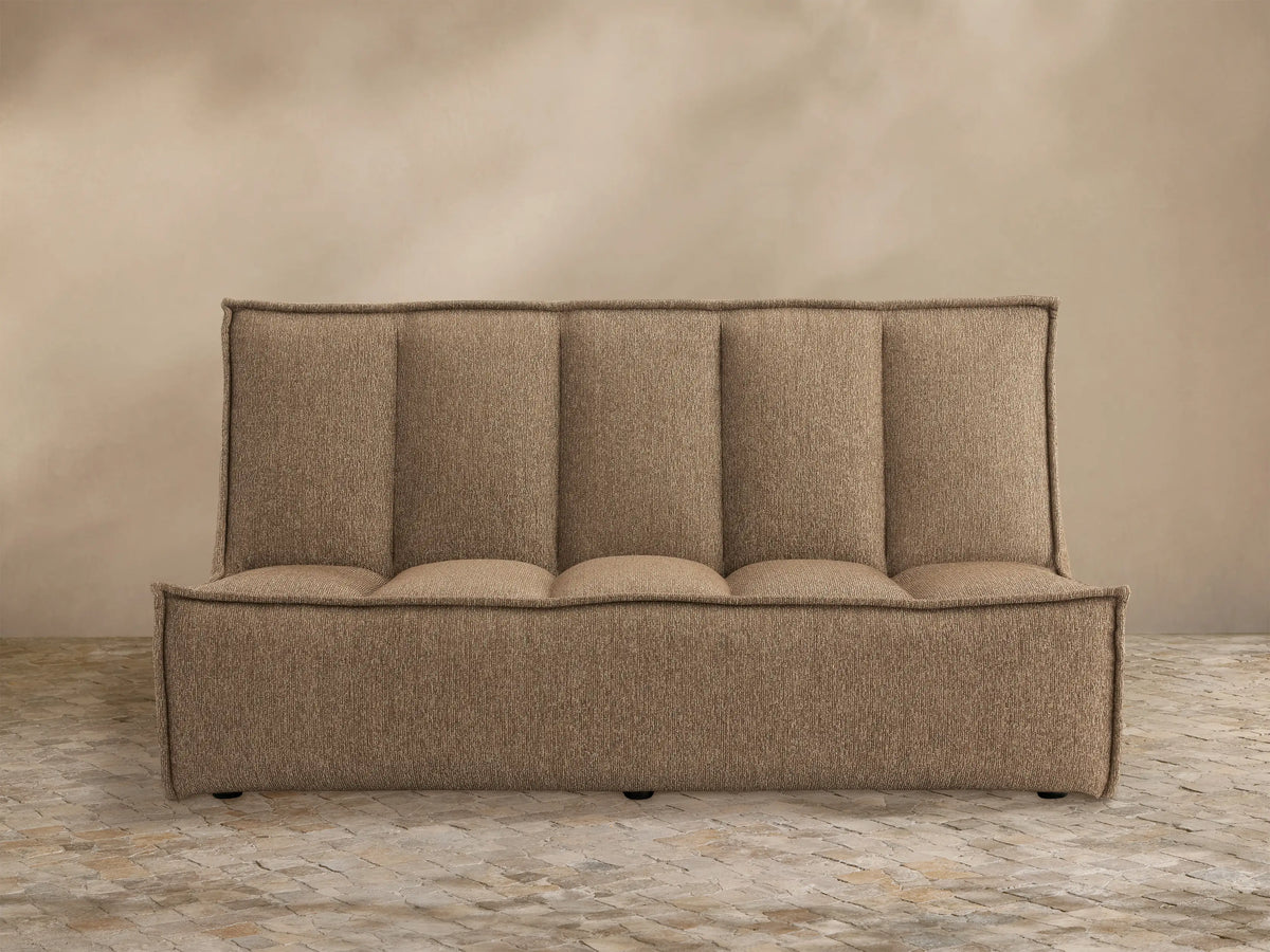 Porto armless sofa in dark beige fabric with channel stitching