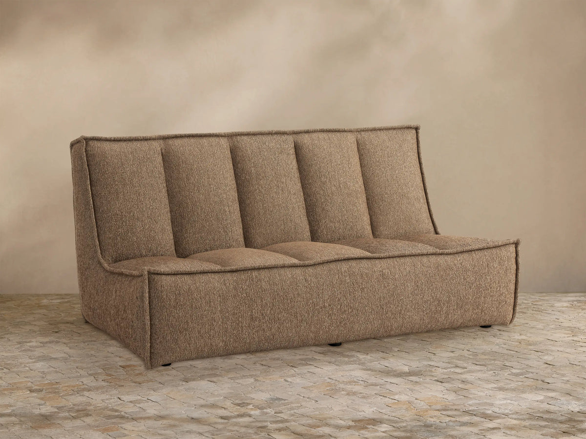 Porto armless sofa in dark beige fabric with channel stitching