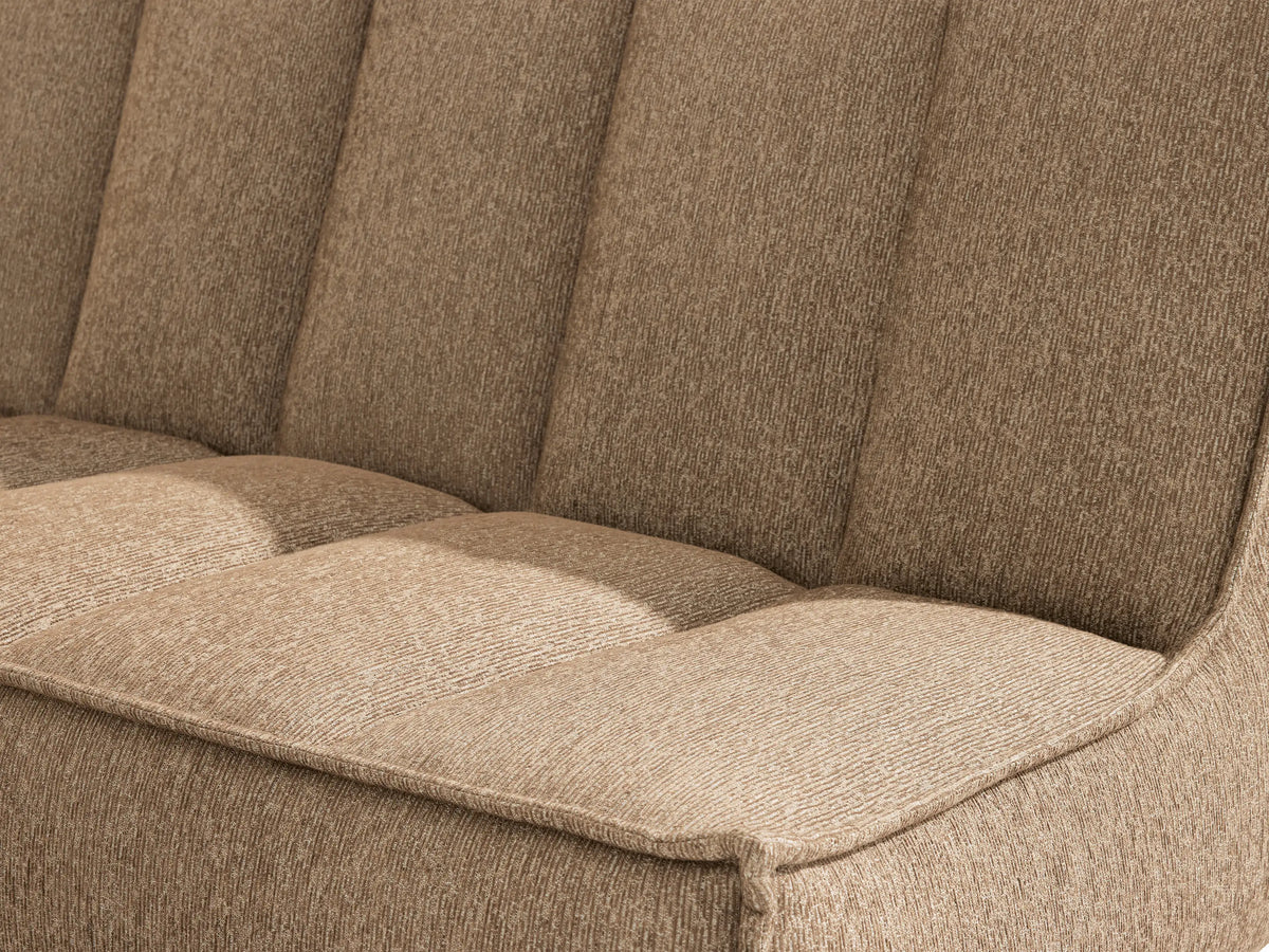 Porto armless sofa in dark beige fabric with channel stitching