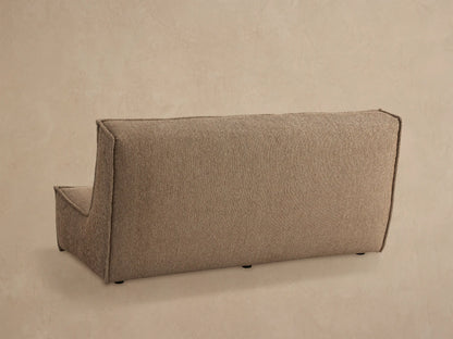 Close up of Porto armless sofa in dark beige fabric with channel stitching