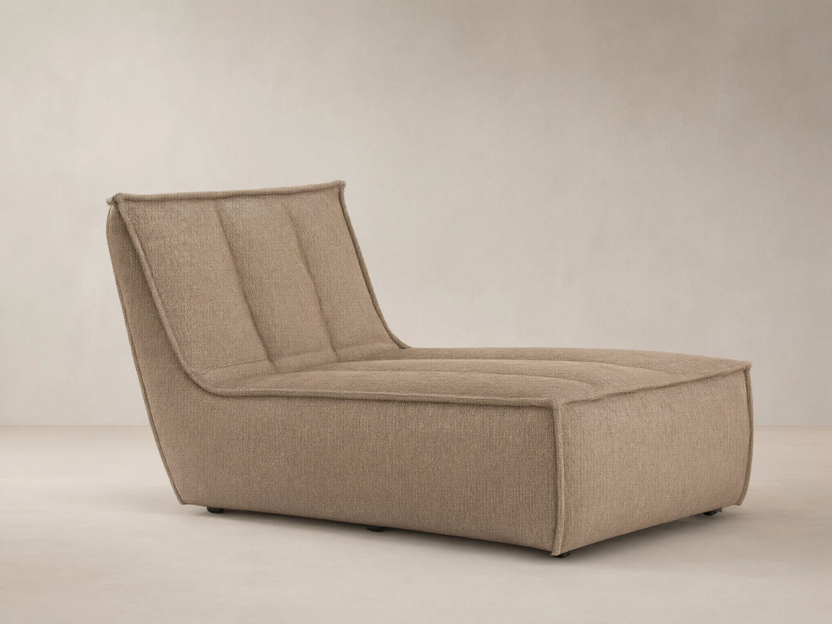 Porto armless chaise in dark beige fabric with channel stitching