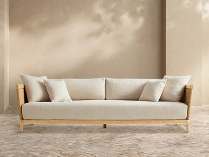 Light grey textured Puglia outdoor collection cover, rectangular, draped over furniture, front view, in warm beige interior.