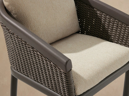 Puglia Outdoor Aluminum Dining Chair, front view. Dark bronze aluminum frame, dark brown woven resin wicker, light beige cushions.