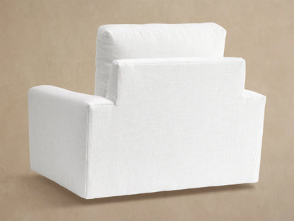 Close-up of the Remington Outdoor Swivel Chair, showing its textured Eden Snow fabric on the armrest and seat cushion.