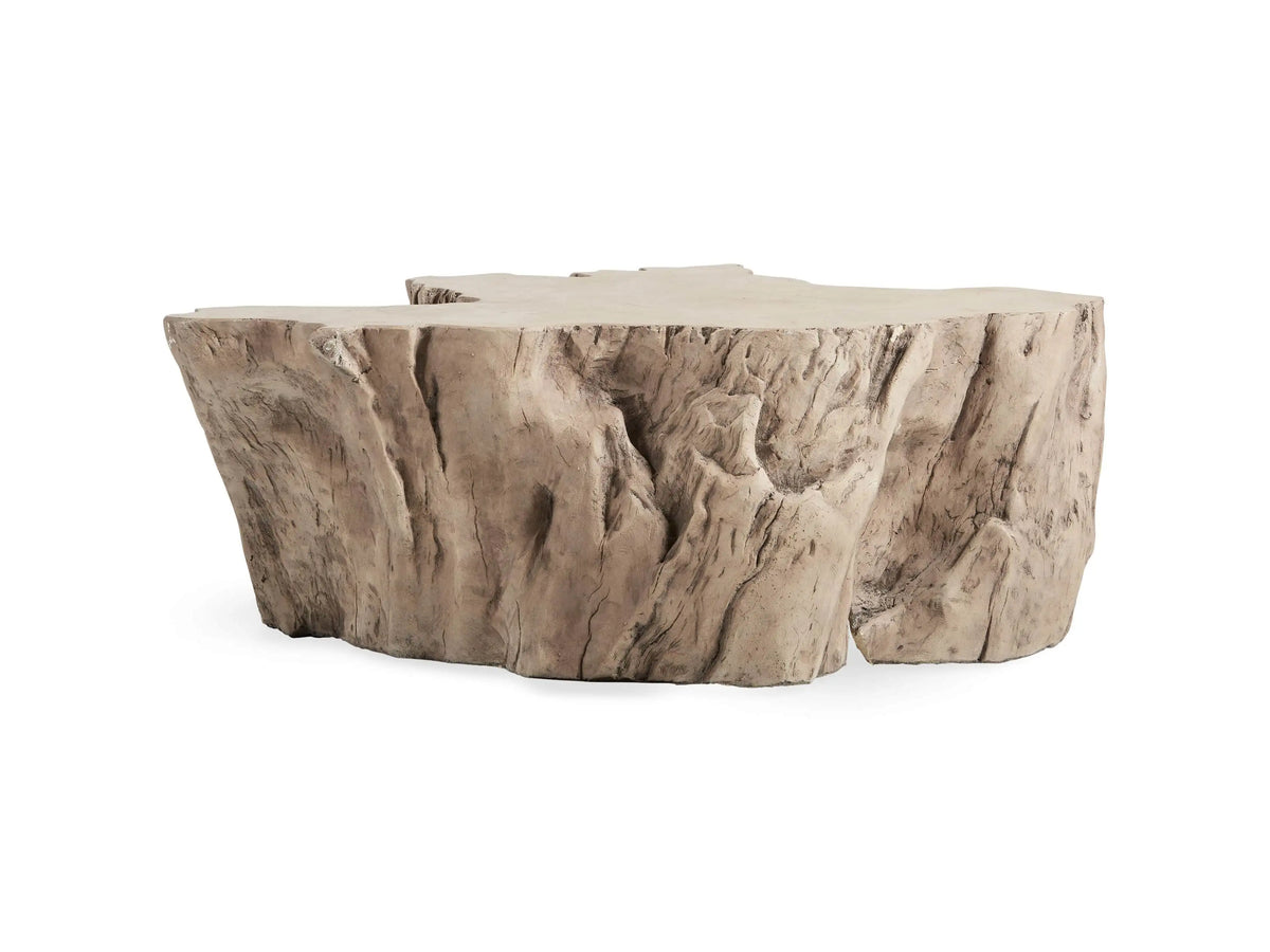 Root Outdoor Bleached Coffee Table with natural tree root texture, smooth glass-like top, and earth-toned finish.