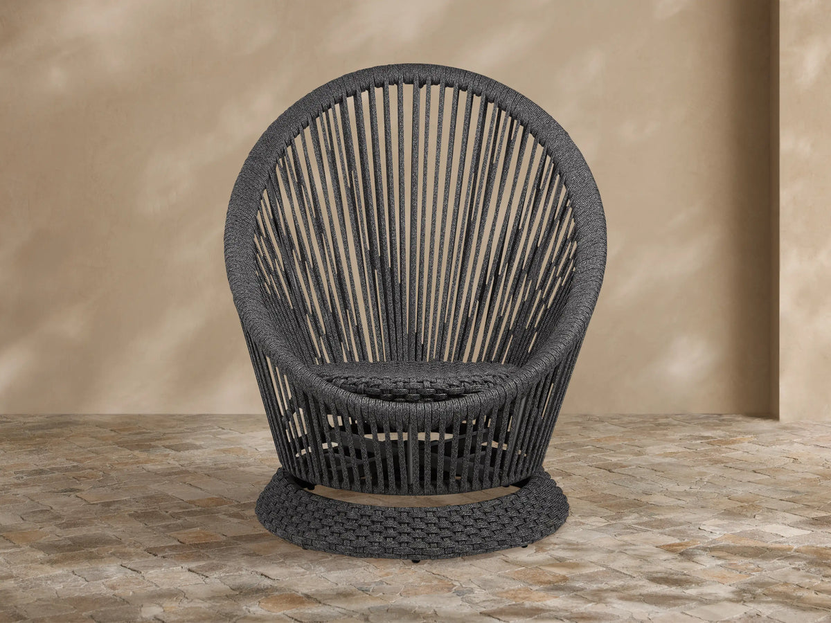 Dark gray Sevilla Outdoor Swivel Chair, round high-back design, woven polyester rope with vertical patterns, textured swivel base.