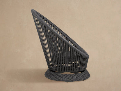 Dark gray Sevilla Outdoor Swivel Chair, round high-back design, woven polyester rope with vertical patterns, textured swivel base.