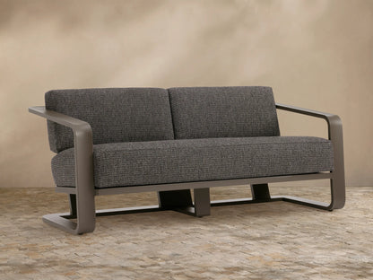 Sonoma Outdoor Aluminum Sofa, front view. Gray powder-coated aluminum frame with dark gray textured fabric cushions.