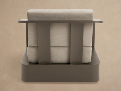 Sonoma Outdoor Aluminum Swivel Chair, angled back. Dark bronze frame, light beige cushions, flat armrests, slatted back.
