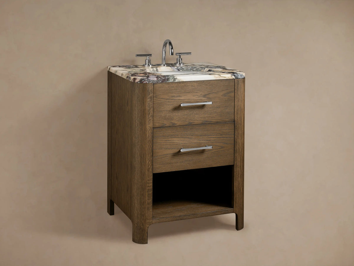 Calista Powder Vanity's open oak drawer with a polished nickel handle, revealing white towels and bottles inside.