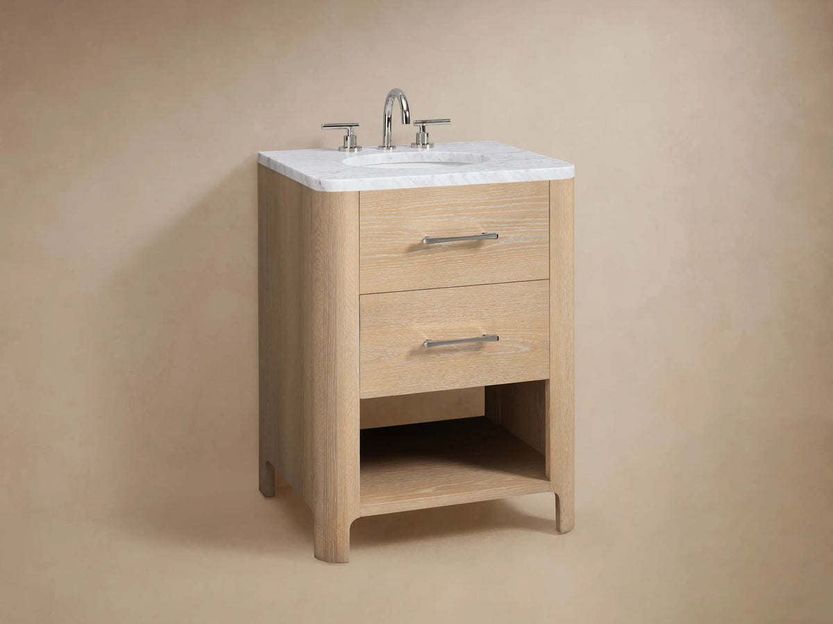 Calista Powder Vanity showing a partially open oak wood drawer with a silver handle, containing a rolled white towel and small items.