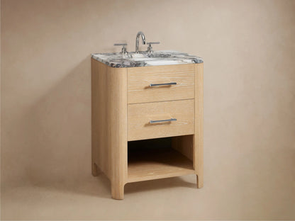Calista Powder Vanity drawer partially open, revealing a towel, light wood texture, silver handle, and small items inside.