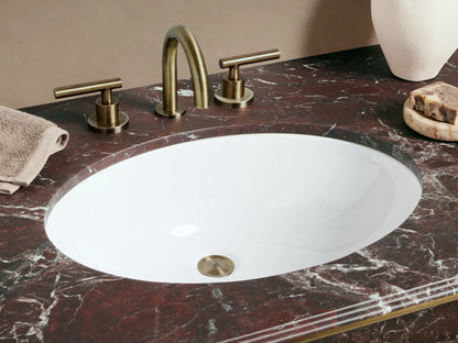 Chelsea Double Washstand: dark red marble top with white veining, two white oval sinks, antique brass frame with glass shelf.