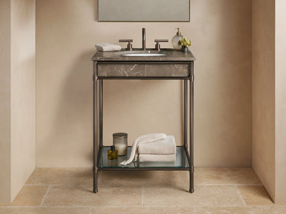 Chelsea Powder Washstand with dark bronze frame, Brown Espresso marble top, white oval sink, and bronze faucet in a powder room.