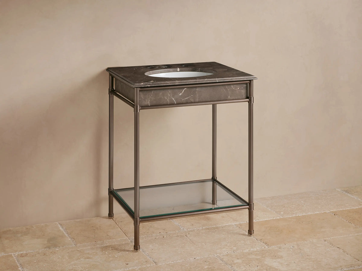 Chelsea Powder Washstand: Brown Espresso marble top with white oval sink & dark faucet, antique bronze frame, glass shelf.