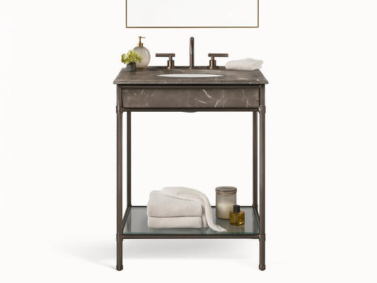 Chelsea Powder Washstand with dark bronze frame, Brown Espresso marble top, white oval sink, and bronze faucet in a powder room.