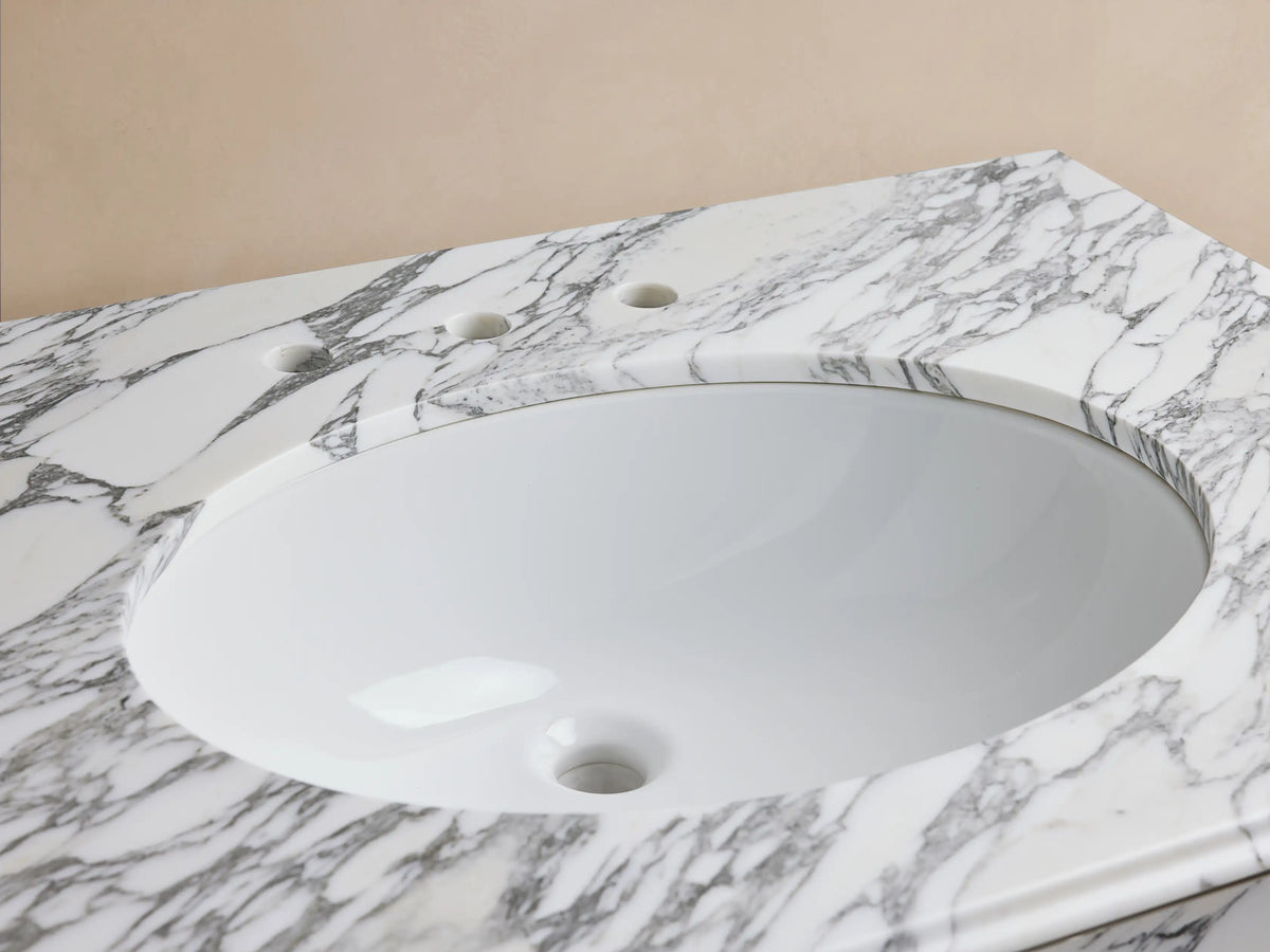 Chelsea Single Washstand with white oval undermount sink, white Carrara marble countertop, polished nickel faucet & soap dispenser.