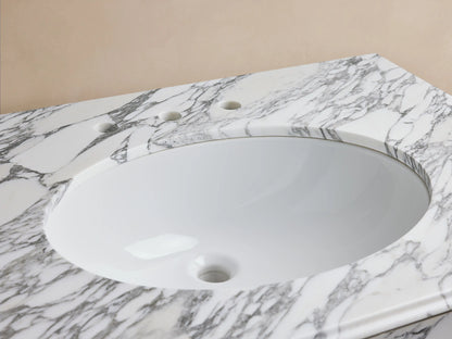 Chelsea Single Washstand with white oval undermount sink, white Carrara marble countertop, polished nickel faucet & soap dispenser.