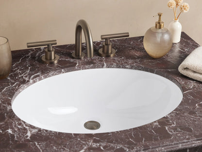 Chelsea Single Washstand with Red Levanto marble top, white oval sink, dark bronze metal frame, and lower glass shelf.
