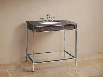 Chelsea Single Washstand close-up: polished nickel frame, glass shelf with a beige textured vase, candle, and folded towels.
