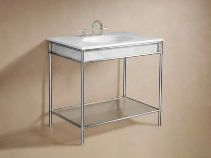 Chelsea Single Washstand close-up: white marble top, polished nickel frame. Glass shelf holds folded white towels & a tray.