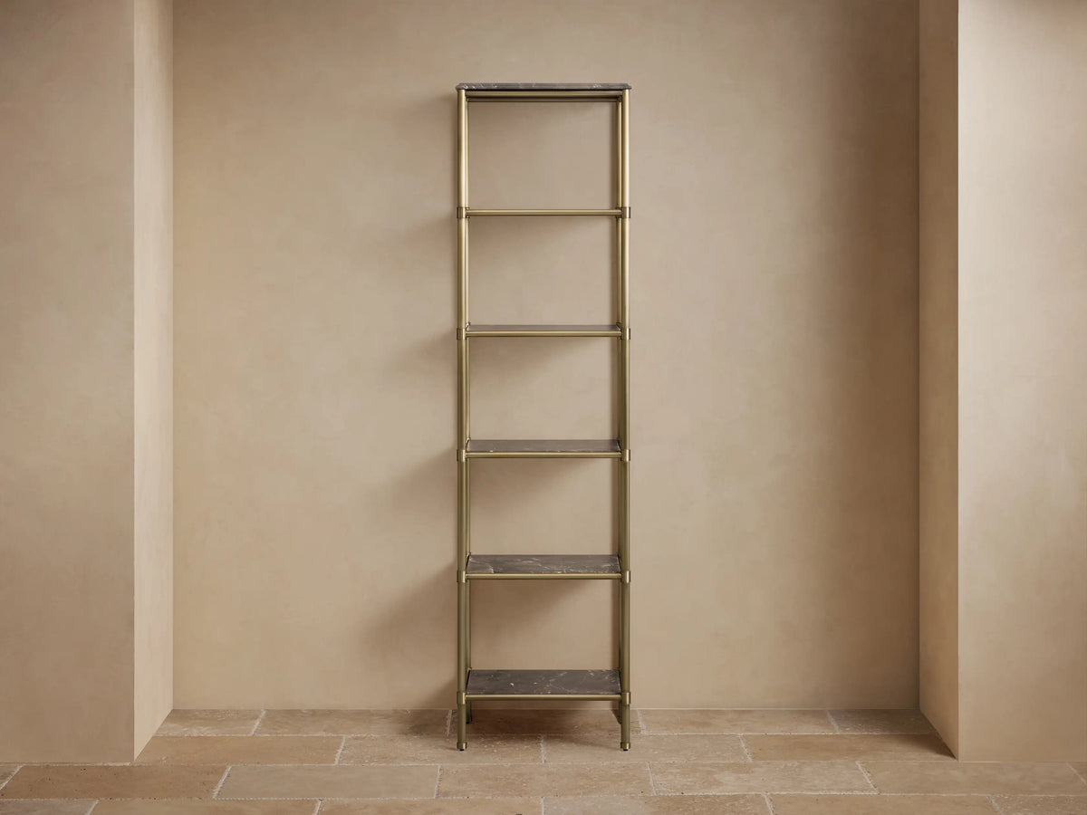 Chelsea Tall Etagere with brown espresso marble shelves, subtle veining, and brass finish metal frame, in close-up view.