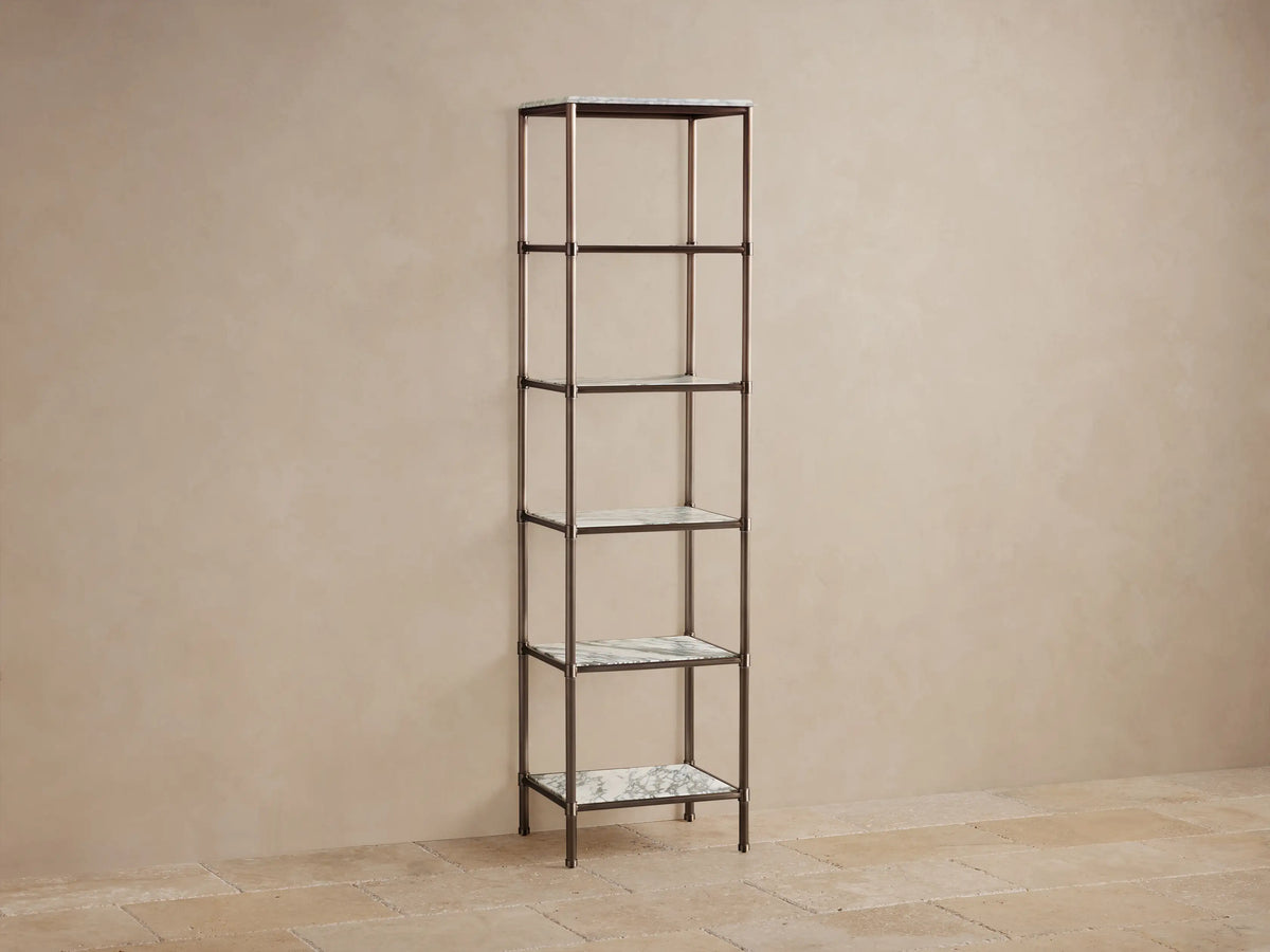 Chelsea Tall Etagere: Antique Bronze frame, 5 white veined marble shelves displaying a vase, jars, pitcher, and folded towels.