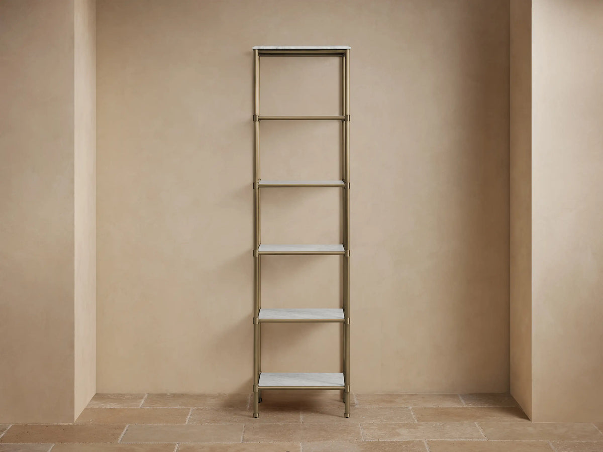 Chelsea Tall Etagere with marble tops, showing two white stone surfaces supported by antique brass finish metal frame.