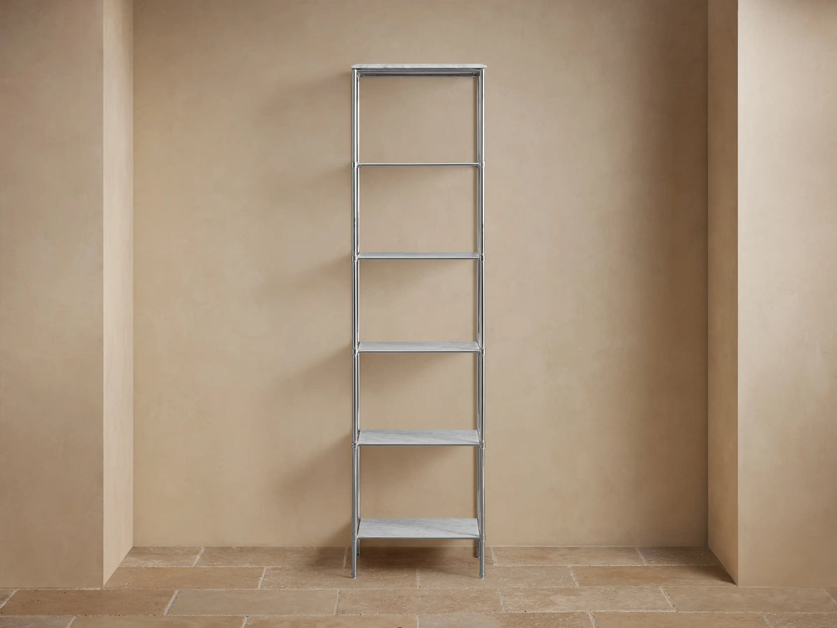 Chelsea Tall Etagere with polished nickel frame and two marble shelves featuring unique veining, viewed at an angle.