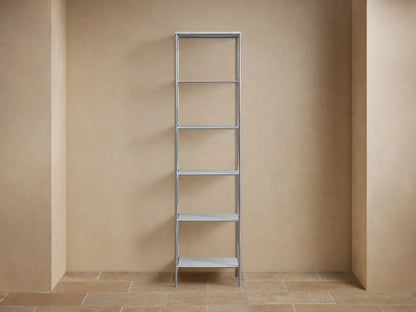 Chelsea Tall Etagere with polished nickel frame and two marble shelves featuring unique veining, viewed at an angle.