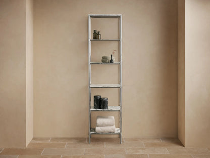 Chelsea Tall Etagere, polished nickel frame, 5 veined marble shelves, displaying towels, bottles, vases in a beige room.
