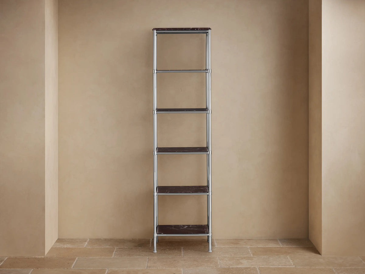 Chelsea Tall Etagere. Close-up of polished nickel frame with dark Red Levanto marble top and white veining.