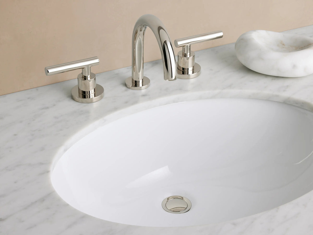 Crewe Smooth Faucet pop-up drain shown in polished nickel finish, set against a smooth white surface.