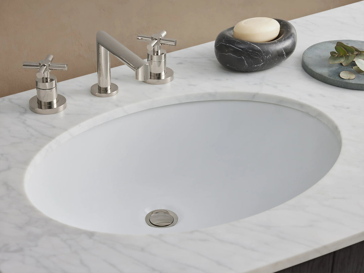 Danny Double Vanity in dark oak with three center drawers and two side cabinets, topped with white marble and dual sinks.
