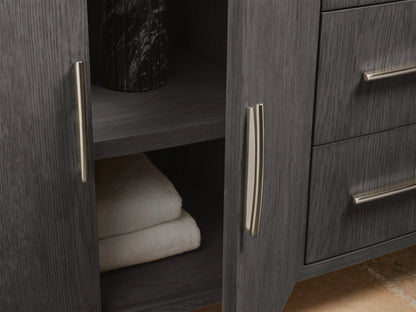 Drawer of Danny Double Vanity in dark oak wood with a white towel, under a marble countertop, silver handle visible.