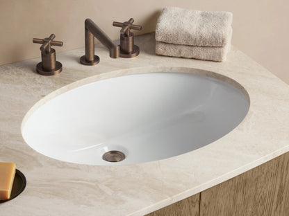 Danny Double Vanity: Curved oak wood vanity with light stone top, 2 oval sinks, 4 doors, 3 central drawers, antique bronze hardware.