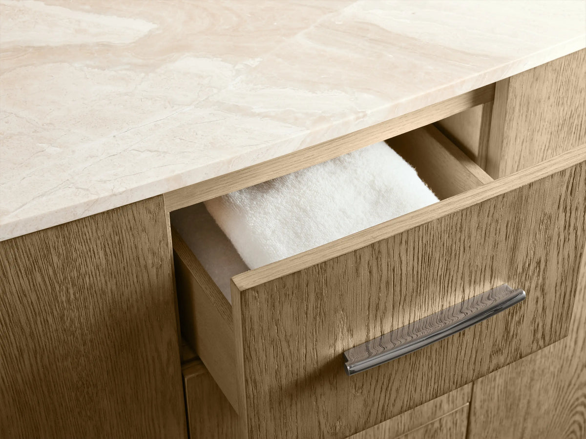 Danny Double Vanity in oak wood, open cabinet, polished nickel hardware, towel inside, visible shelf and door handle, close-up view.