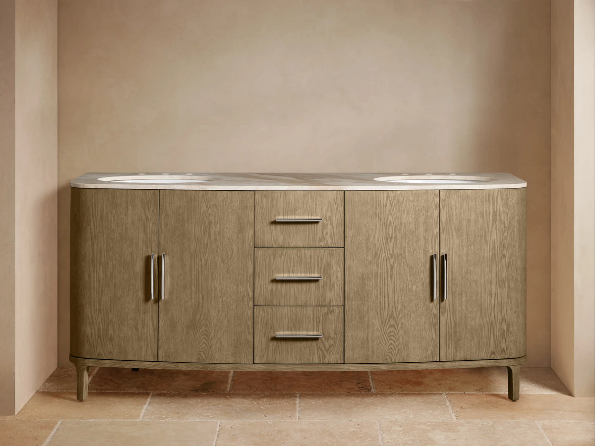 Open wooden drawer of the Danny Double Vanity reveals a soft white towel inside, below a cream marble countertop.
