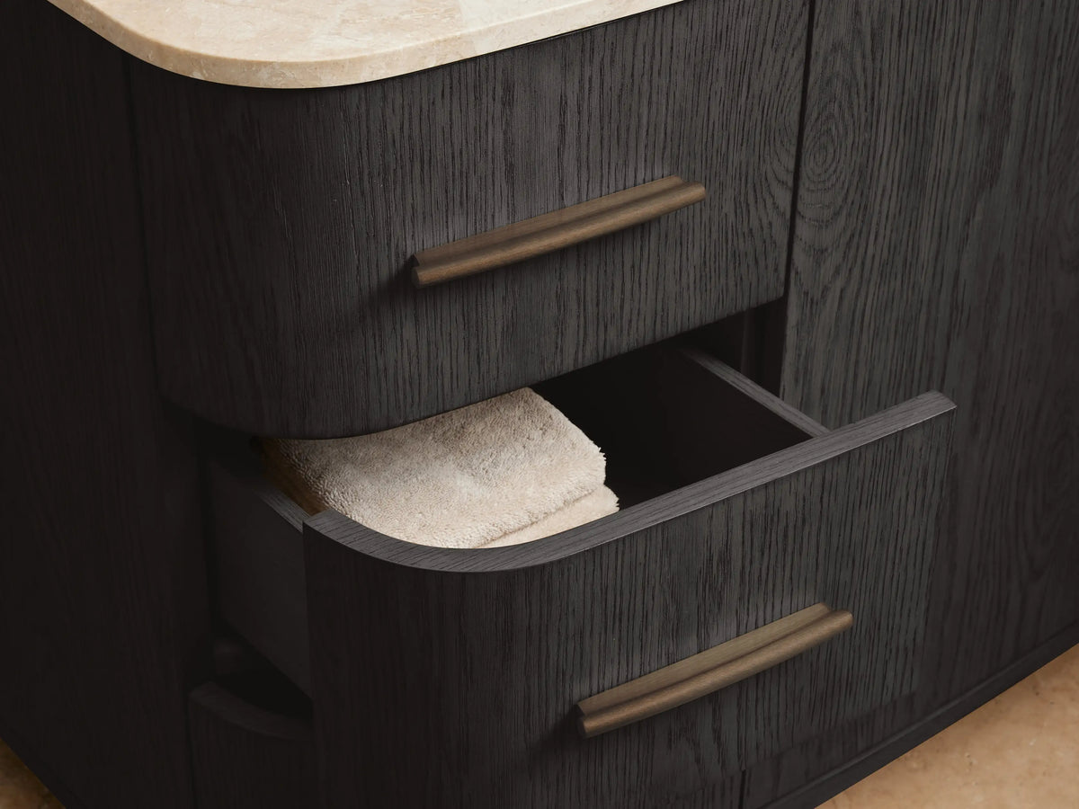 Danny Wide Single Vanity: Oval white ceramic undermount sink set in a light Royal Cream marble countertop with bronze faucet.