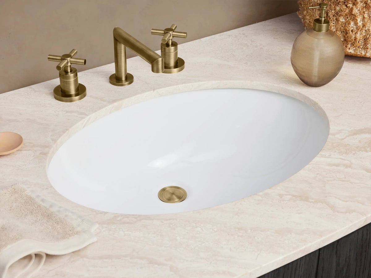 Danny Single Wide Vanity in dark oak finish, featuring a marble top and oval sink. Two center doors, six drawers with antique brass handles.