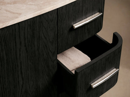 Close-up of Danny Wide Single Vanity: white oval undermount sink, light beige honed stone countertop, chrome faucet, dark wood base.