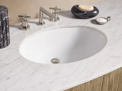 Danny Single Wide Vanity featuring oak wood with a marble top; includes drawers and doors with metallic handles; sink and faucet on top.