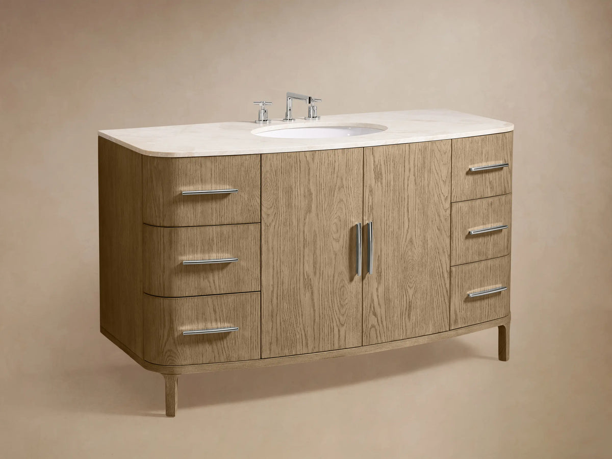 Danny Single Wide Vanity with open drawer, showing a towel inside. Oak wood finish, silver handles, marble countertop partly visible.