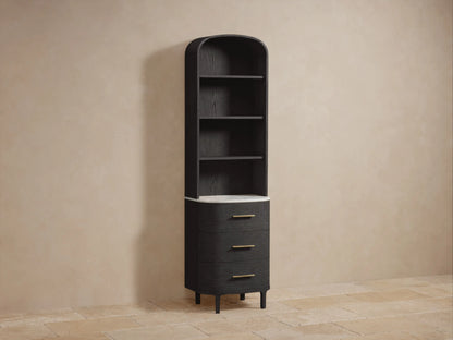 Danny Bath Cabinet: Close-up of dark oak wood shelves. White towels on top shelf, plant & candle on white marble base.