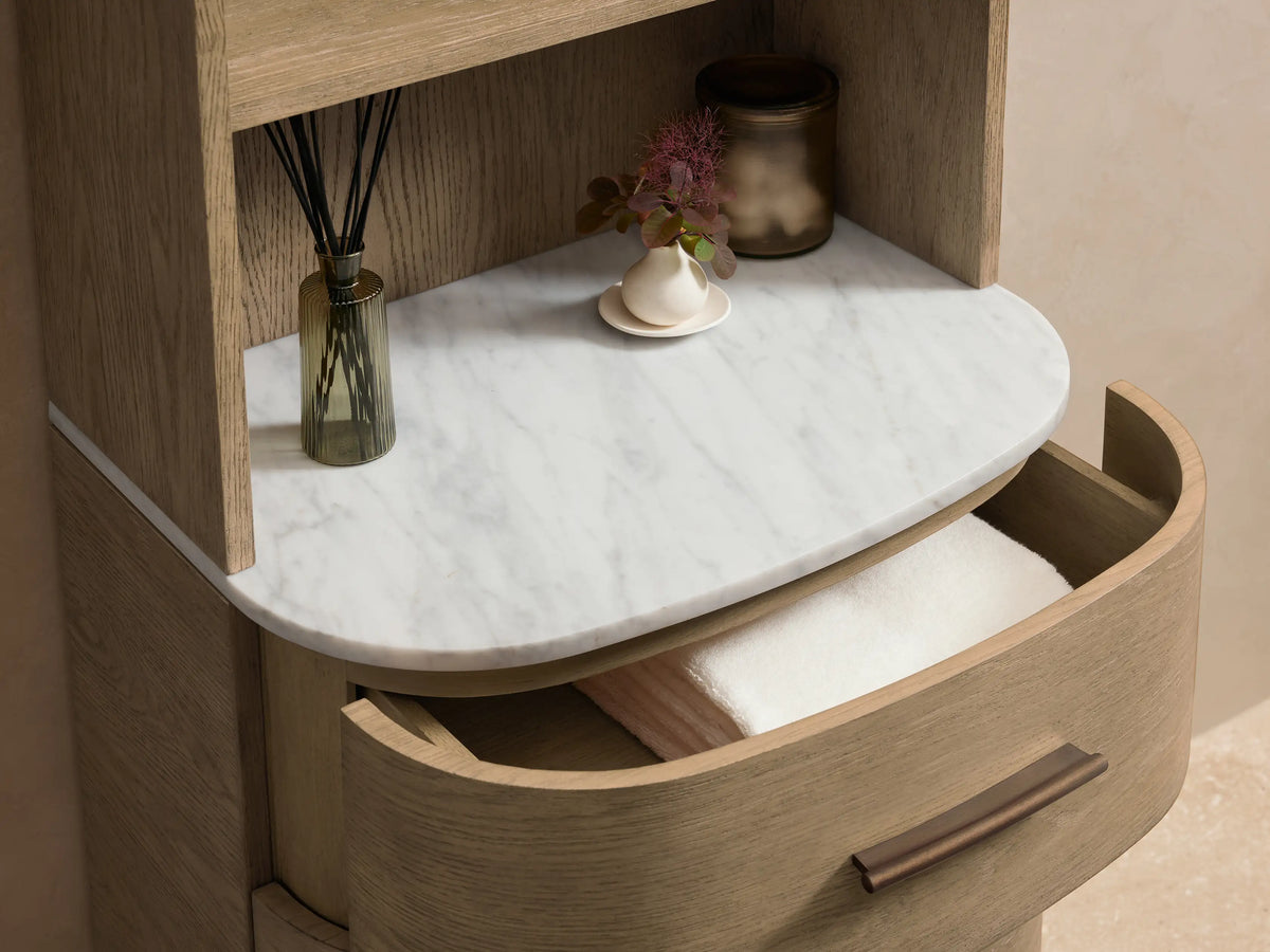 Light oak Danny Bath Cabinet with arched top, 4 open shelves, white marble, and 3 drawers with dark pulls.