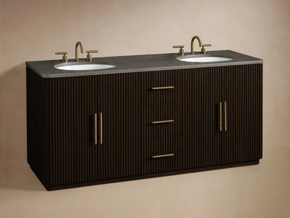 Finnley Double Vanity: dark brown fluted cabinet with antique brass pulls, gray bluestone top, and two white oval undermount sinks.