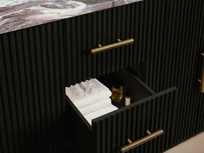 Close-up of Finnley Double Vanity's black ribbed door, slightly open, with a gold handle, revealing an interior shelf with white towels.