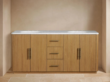 Finnley Double Vanity with oak wood finish, fluted design, two white sinks, three central drawers, and open door showing shelves.