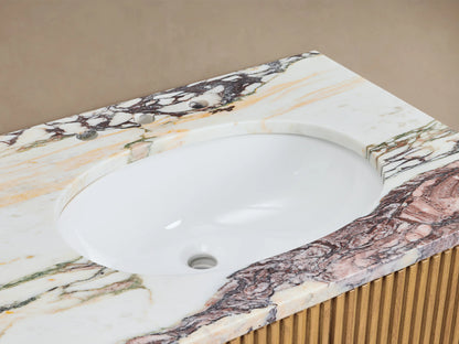 Finnley Double Vanity close-up: patterned Calacatta Viola marble countertop, white oval sink, chrome faucet, slatted wood base.